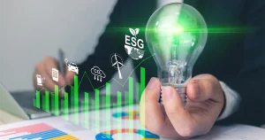 A corporate presenter stands before a world map with logistics icons, explaining the international reach and operational benefits of obtaining an ISO 50001 Energy Management Certification in UAE.